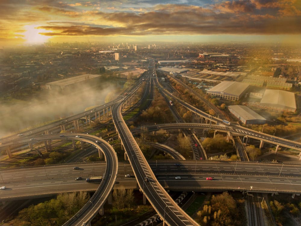 Birmingham UK Spaghetti Junction aerial with city centre background
