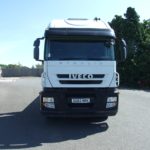 IVECO STRALIS 310 26T FLATBED FRONT VIEW