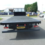 IVECO 180 E24 SLEEPER CAB FLATBED REAR VIEW